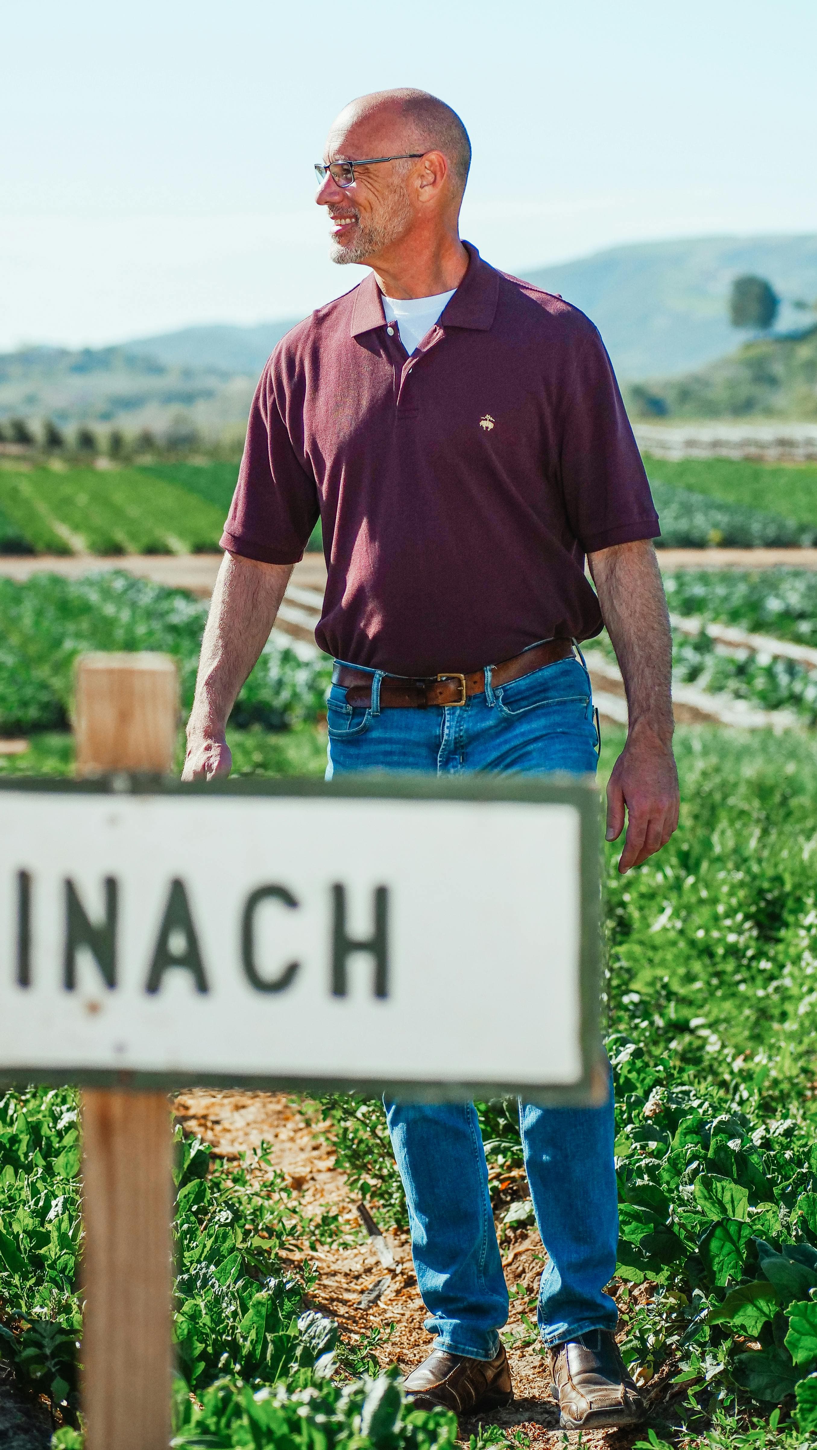 Farmer working in agricultural field at Green Valley Farms